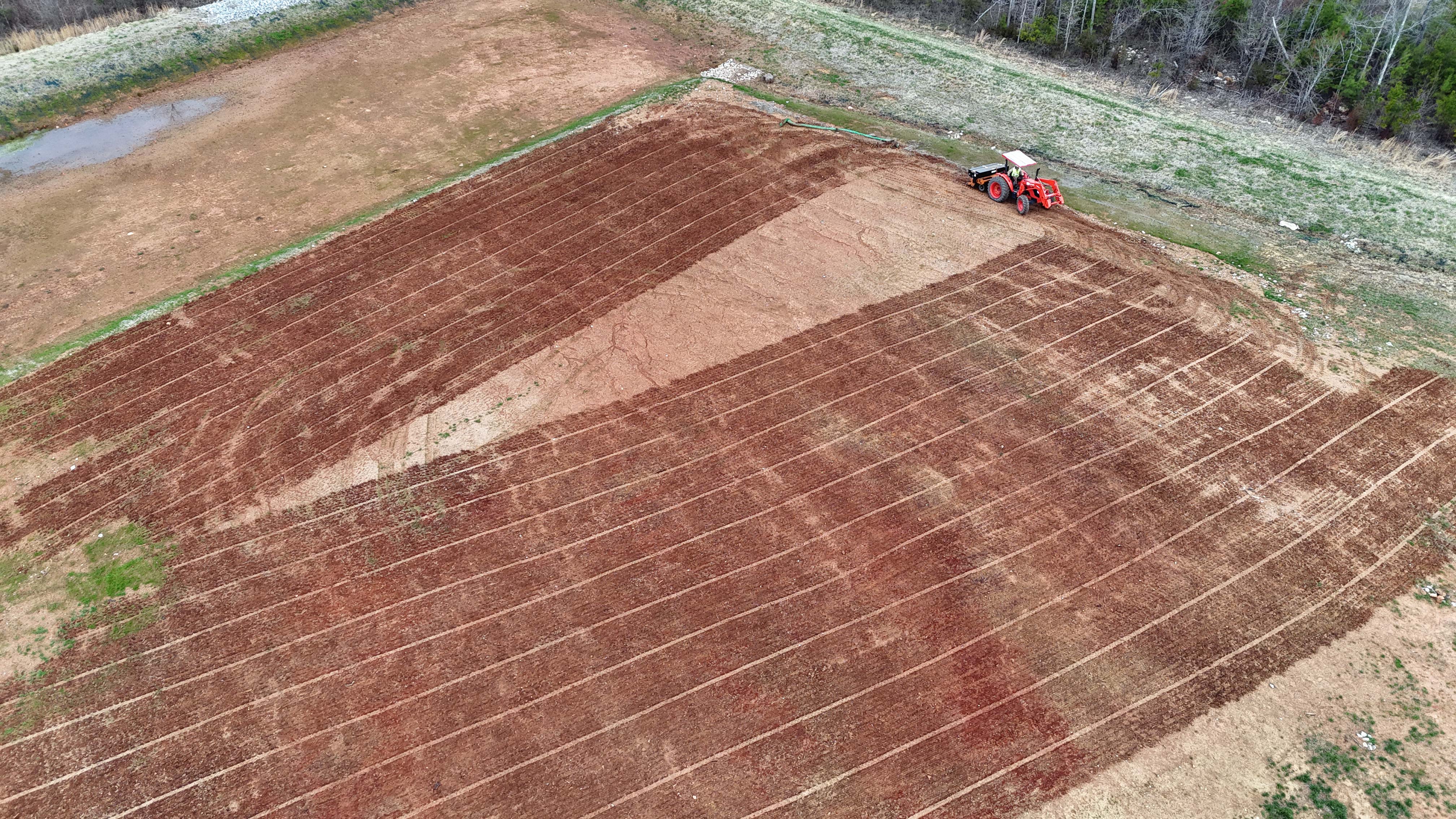 Erosion control blanket installation on cut slope